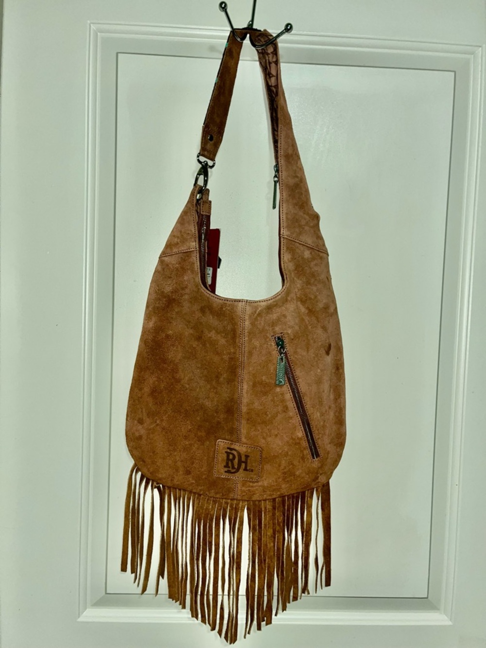Suede Fringe Hobo Bag in Brown beating on strap, genuine leather